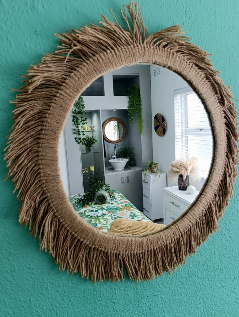 Soft textures and earthy tones in a massage room featuring a floral arrangement and minimalist decor.