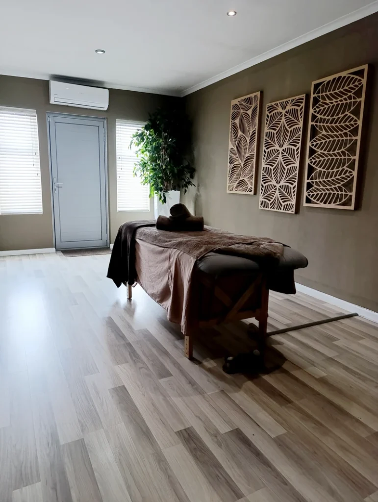 Tranquil massage therapy room at Absolute Beauty in Brackenfell, Cape Town – ideal for full-body and hot stone massages.