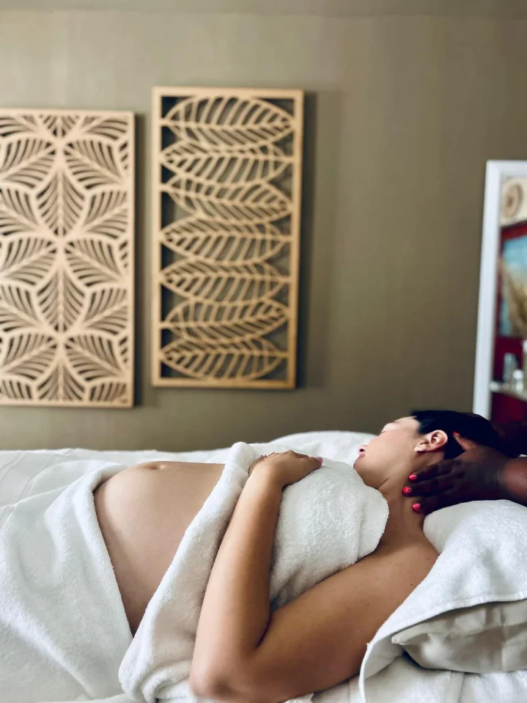 Relaxing prenatal massage in Brackenfell with client receiving neck and shoulder therapy